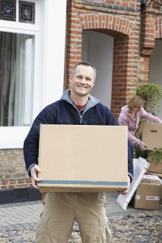 Packed boxes and household furniture ready for a flat move in Haringey