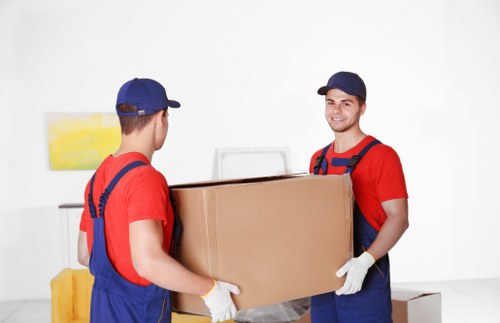 Removal team preparing a move in a Haringey residential street