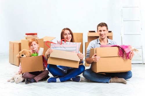 Packed office equipment and furniture ready for transport