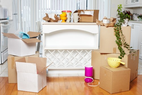 Professional movers handling furniture during a local home removal