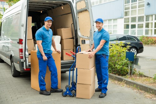 Student removals team helping with boxes in a Haringey residential street