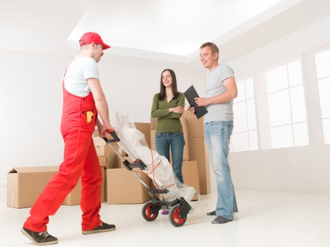 Professional movers navigating a residential street in Haringey
