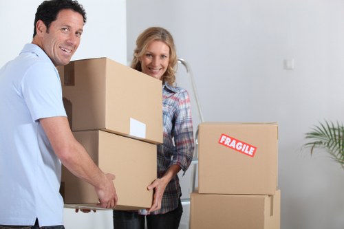 Team preparing desks and equipment during office removals in Haringey